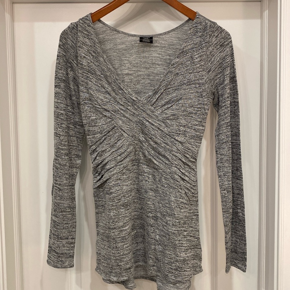 ASTARS grey long-sleeved top.